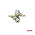 3.1 g 18k gold and platinum Bypass Ring, 2 center stones 0.90 ct and diamonds