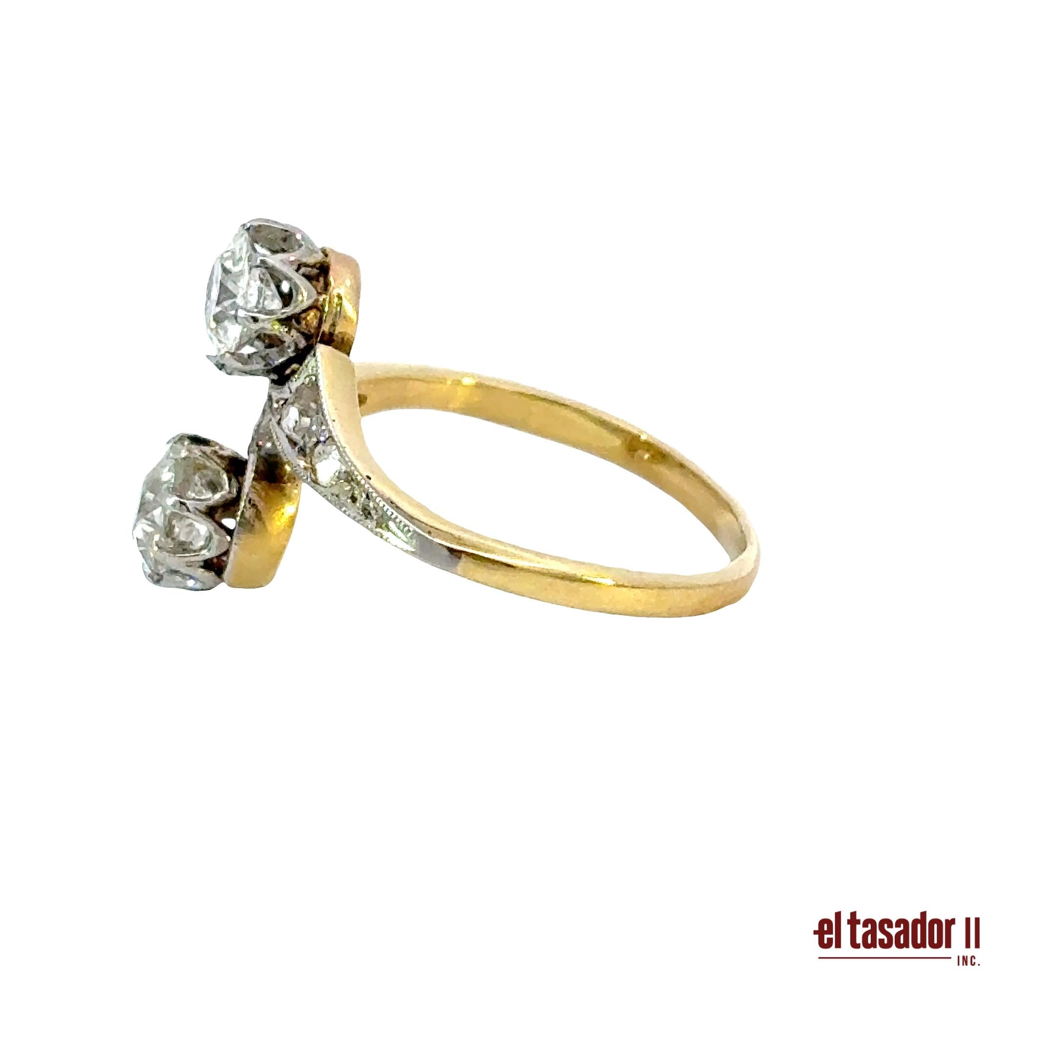 3.1 g 18k gold and platinum Bypass Ring, 2 center stones 0.90 ct and diamonds