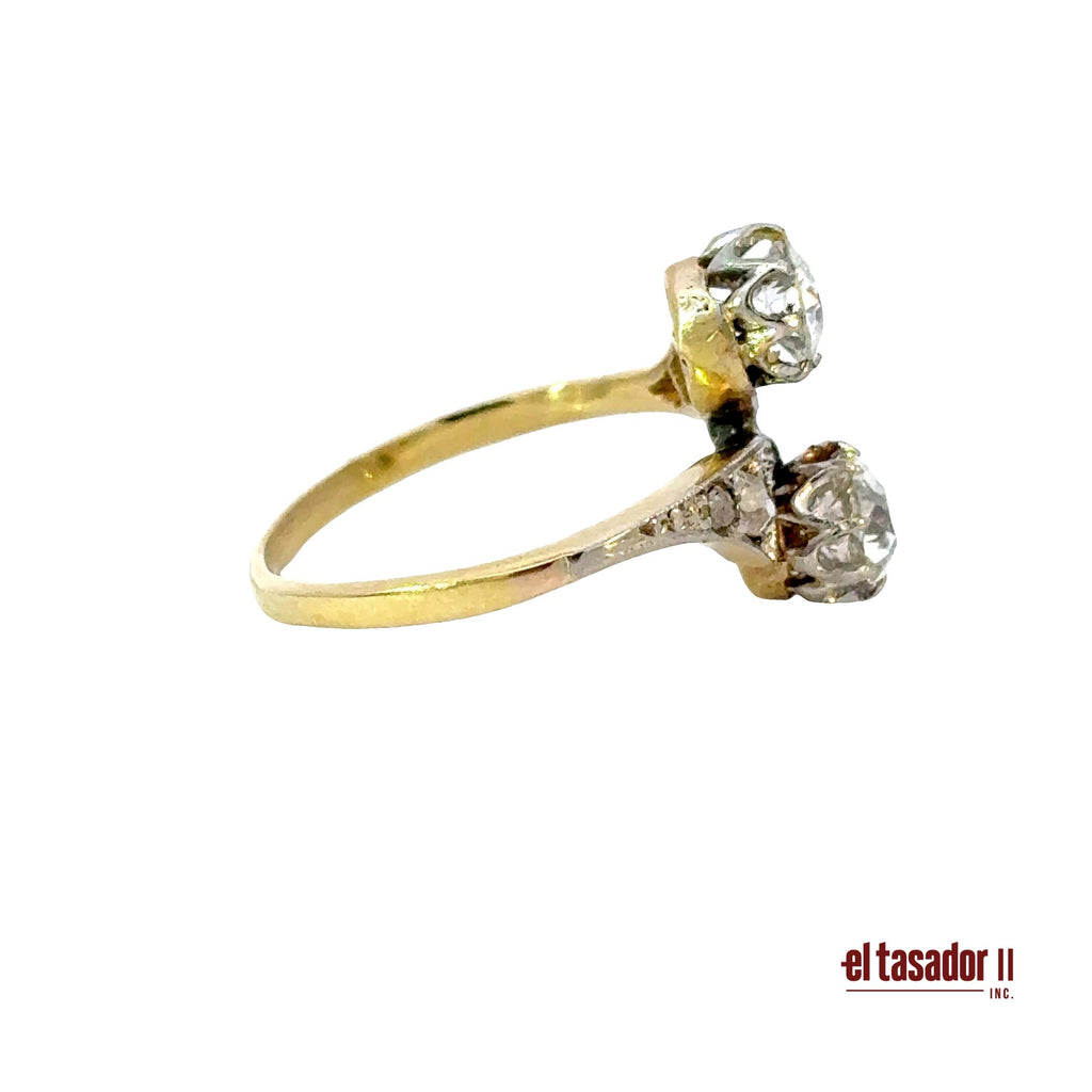 3.1 g 18k gold and platinum Bypass Ring, 2 center stones 0.90 ct and diamonds