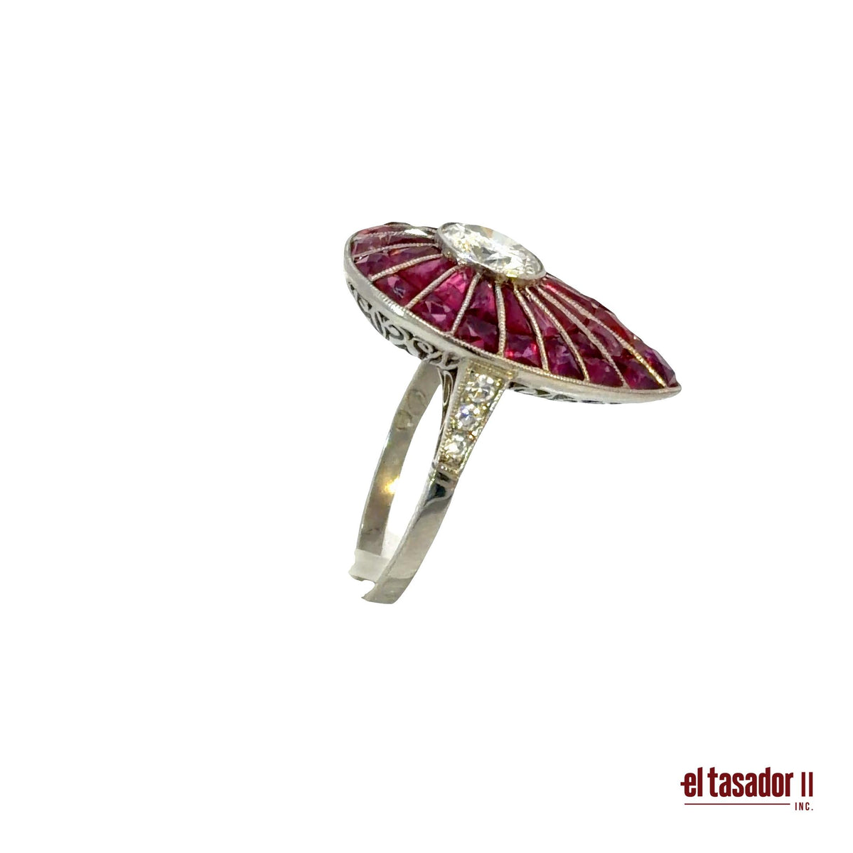 Drop ring 8.2 g platinum, center stone 1.31 ct, rubies and diamonds (N)