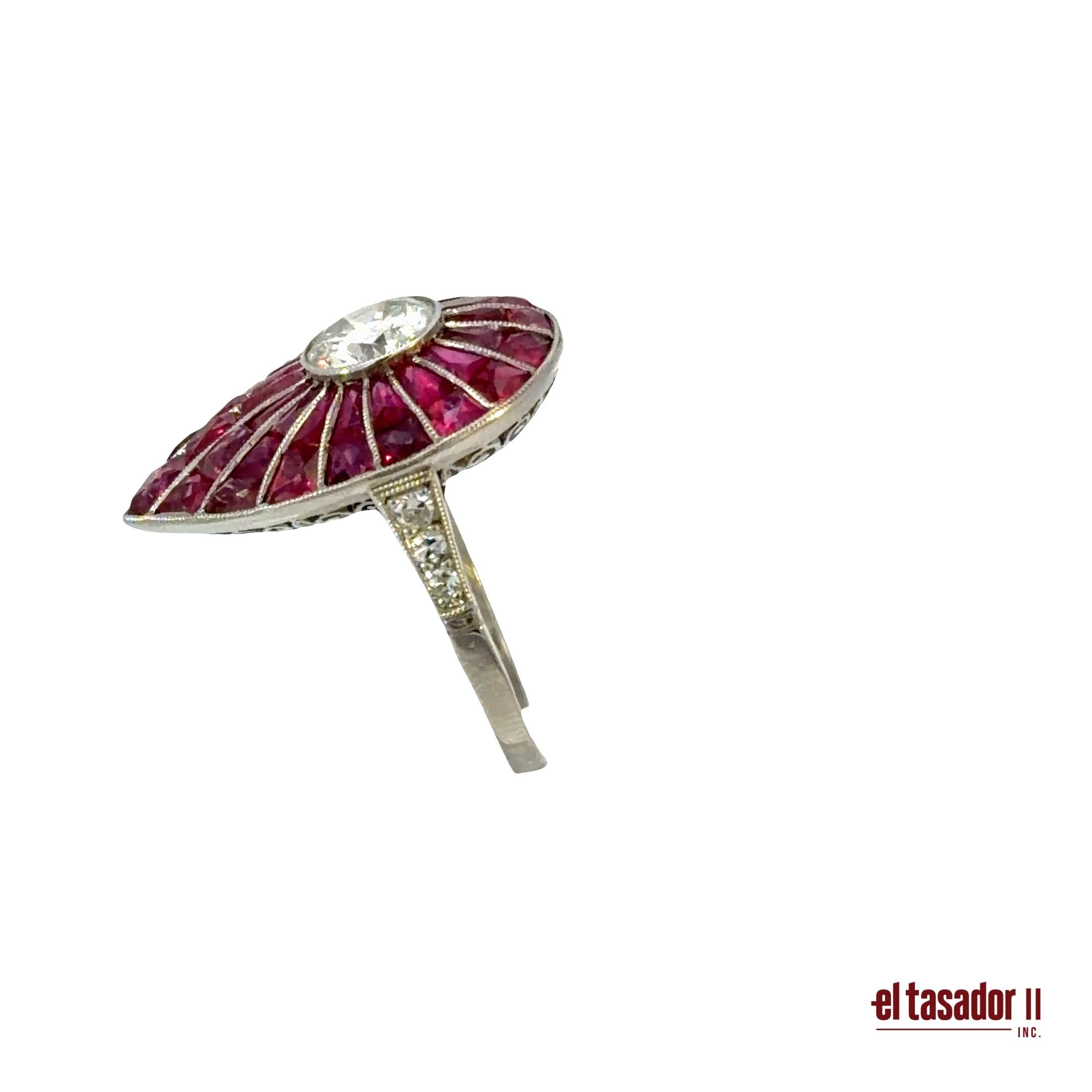 Drop ring 8.2 g platinum, center stone 1.31 ct, rubies and diamonds (N)