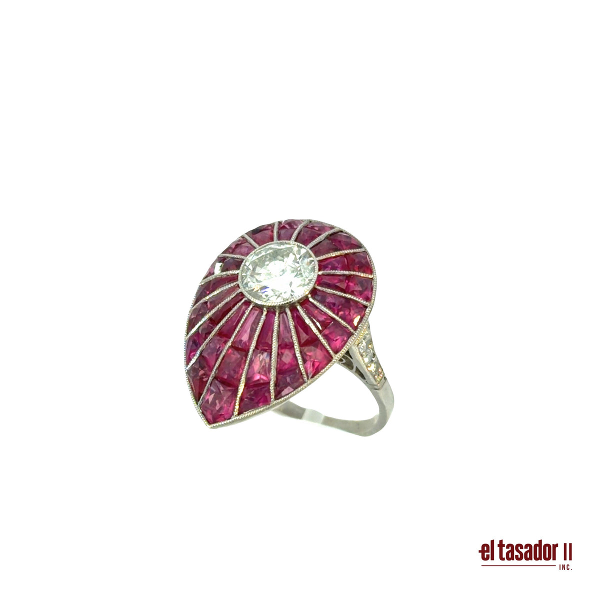 Drop ring 8.2 g platinum, center stone 1.31 ct, rubies and diamonds (N)
