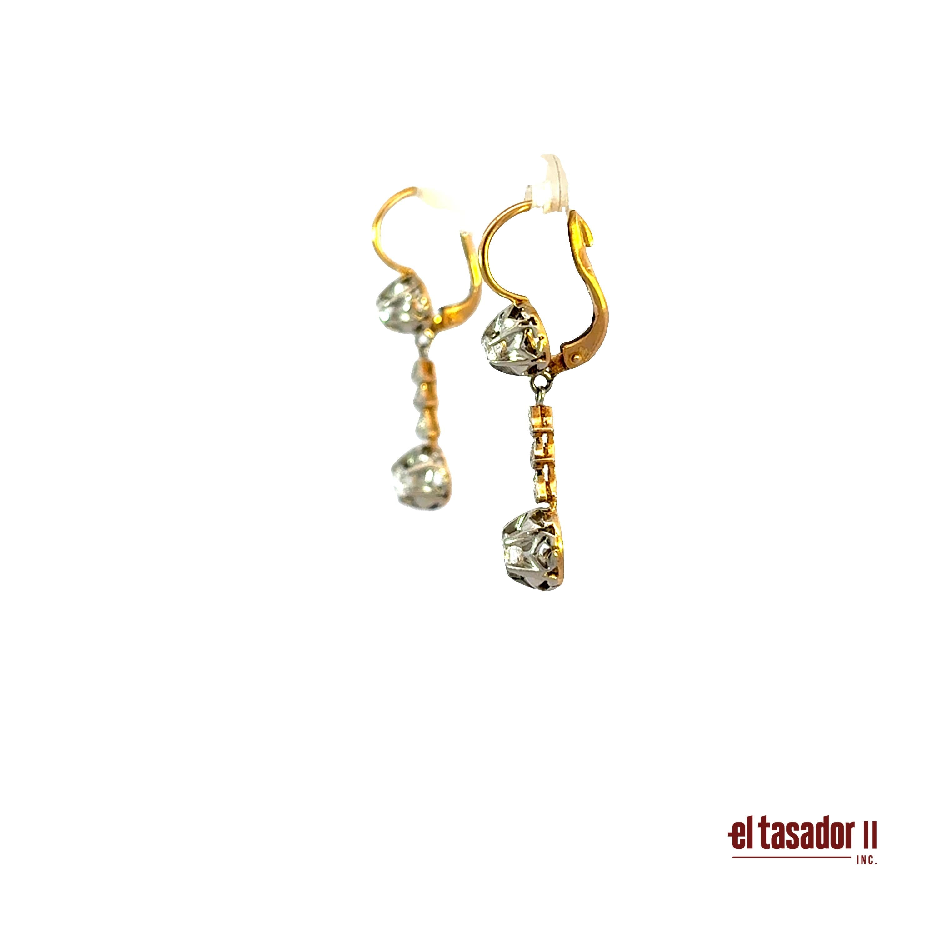 Earrings 5.1 g 18k gold and platinum, 2 center stones 0.25 ct and diamonds (A)