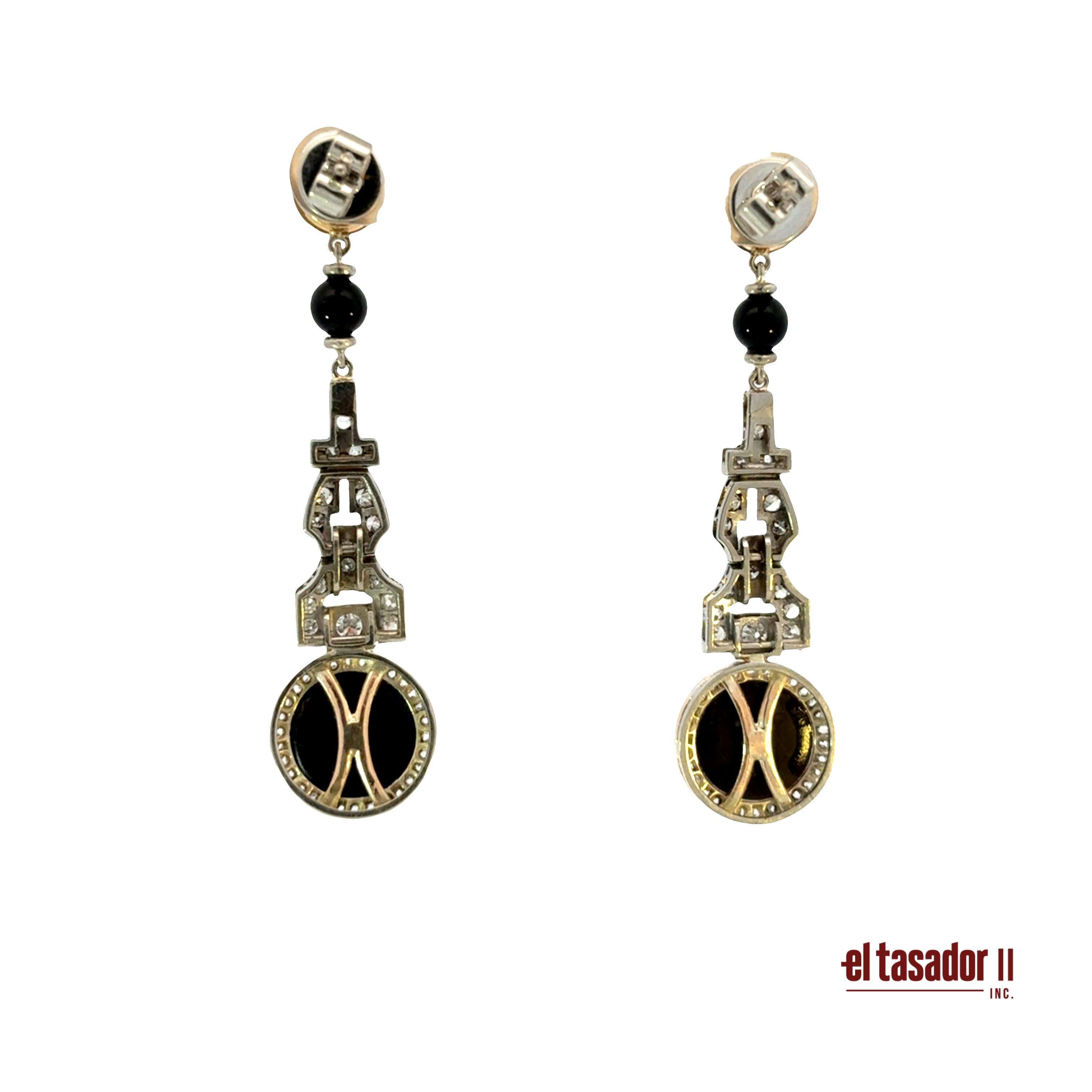 Drop earrings 12.8 g gold & platinum, Center 0.80 ct, onyx & 0.60 ct of diamonds