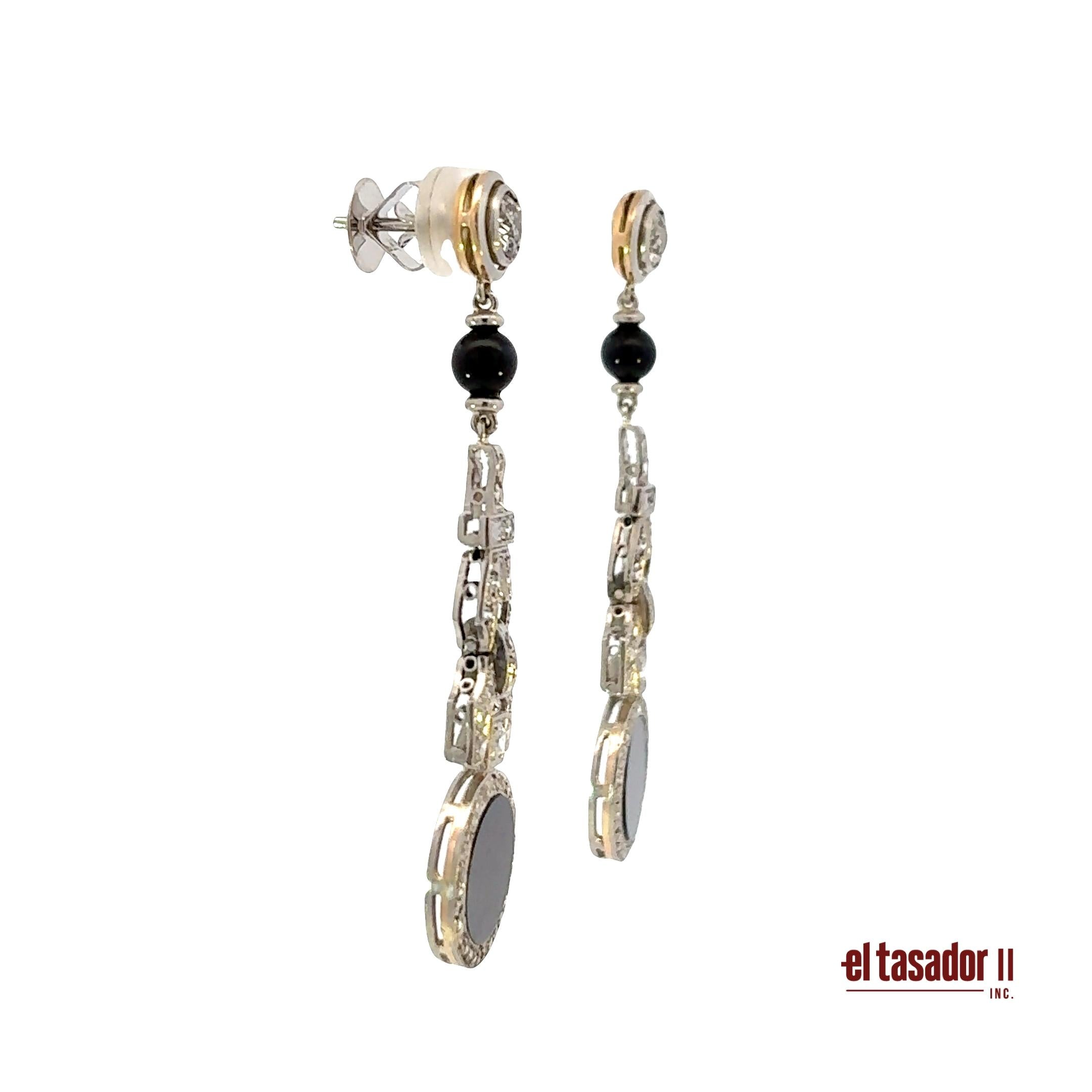 Drop earrings 12.8 g gold & platinum, Center 0.80 ct, onyx & 0.60 ct of diamonds