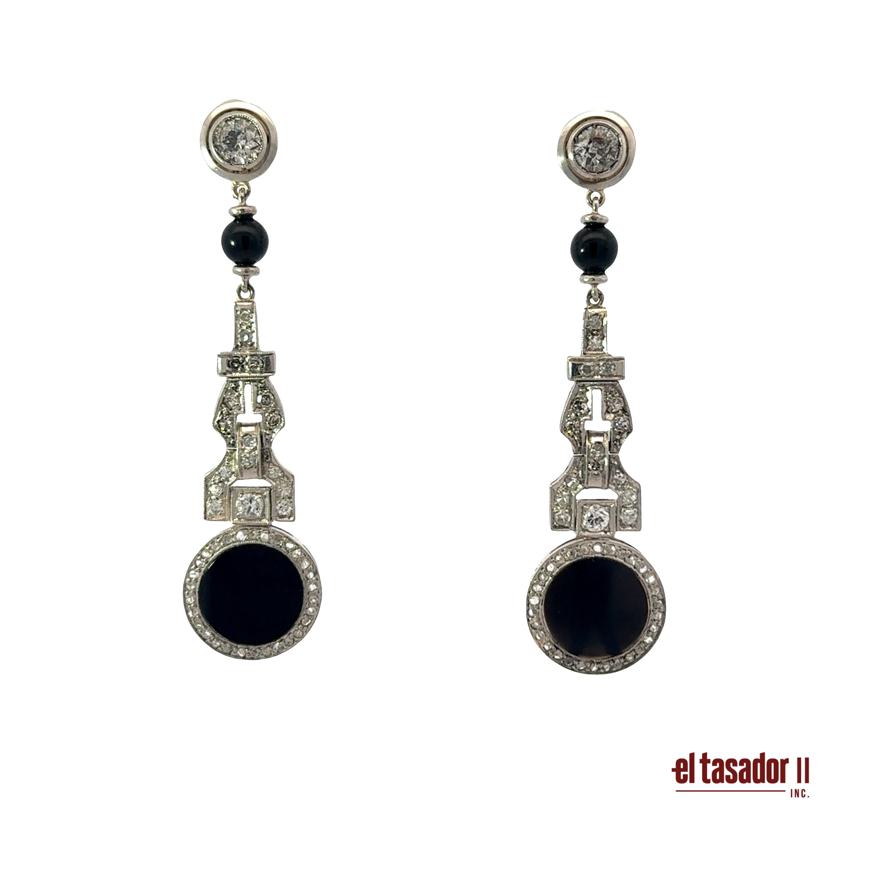 Drop earrings 12.8 g gold & platinum, Center 0.80 ct, onyx & 0.60 ct of diamonds