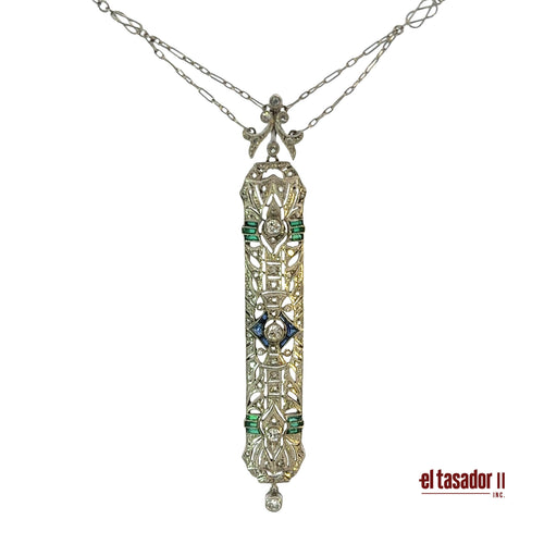 8.8 g 18k gold and platinum pendant, sapphires, emeralds and 0.34 ct of diamonds
