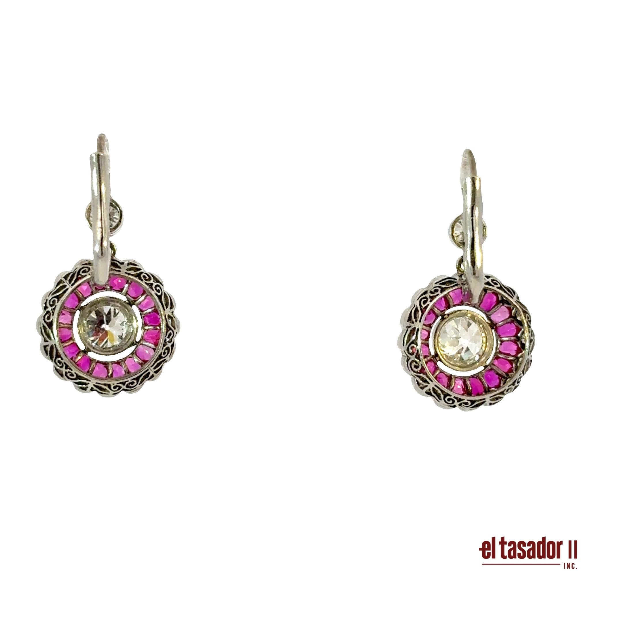 Earrings 6.5 g of platinum, Old cut center stones 1.28 ct and samll diamonds