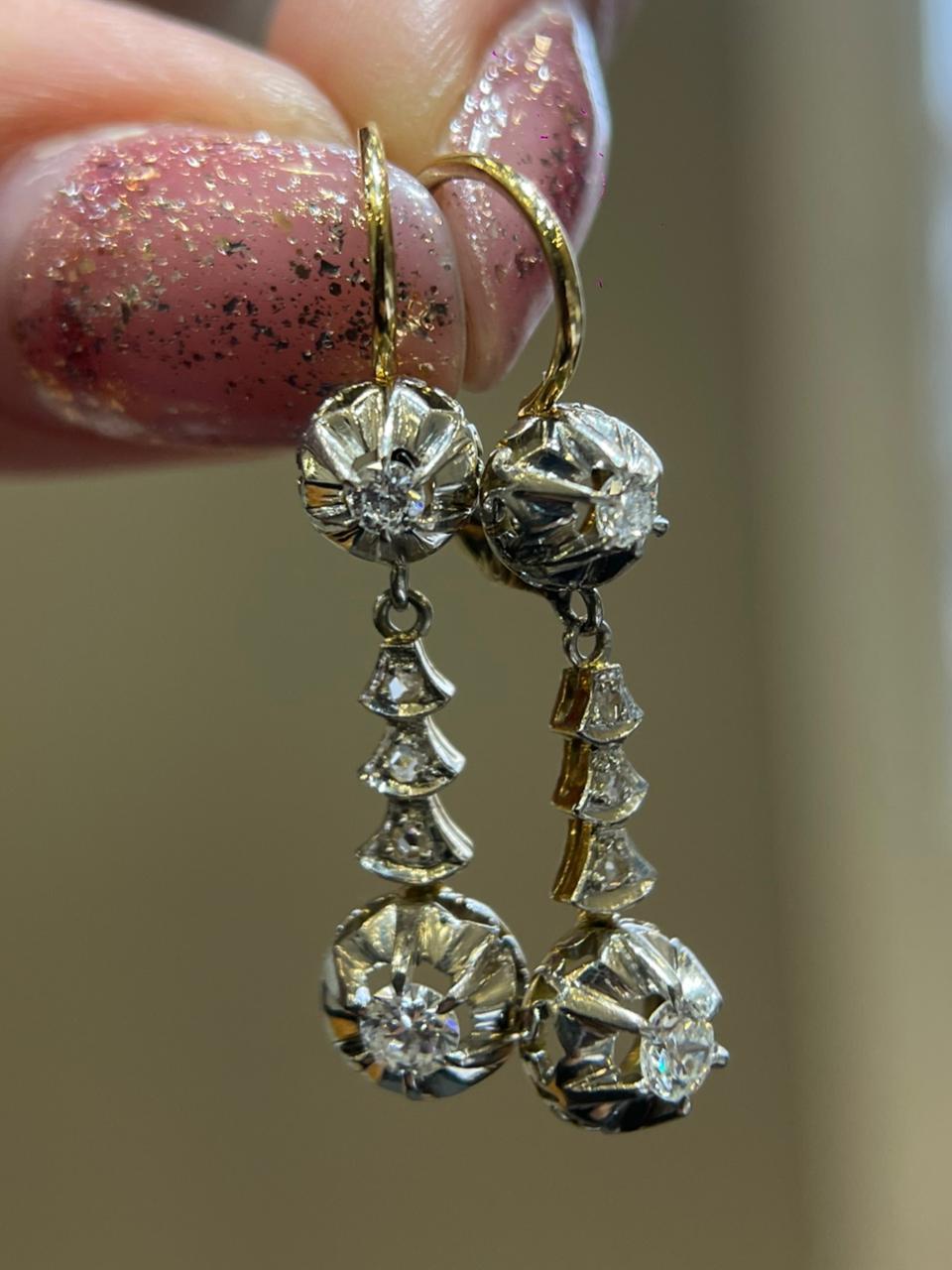 Earrings 5.1 g 18k gold and platinum, 2 center stones 0.25 ct and diamonds (A)