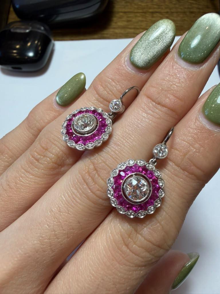 Earrings 6.5 g of platinum, Old cut center stones 1.28 ct and samll diamonds