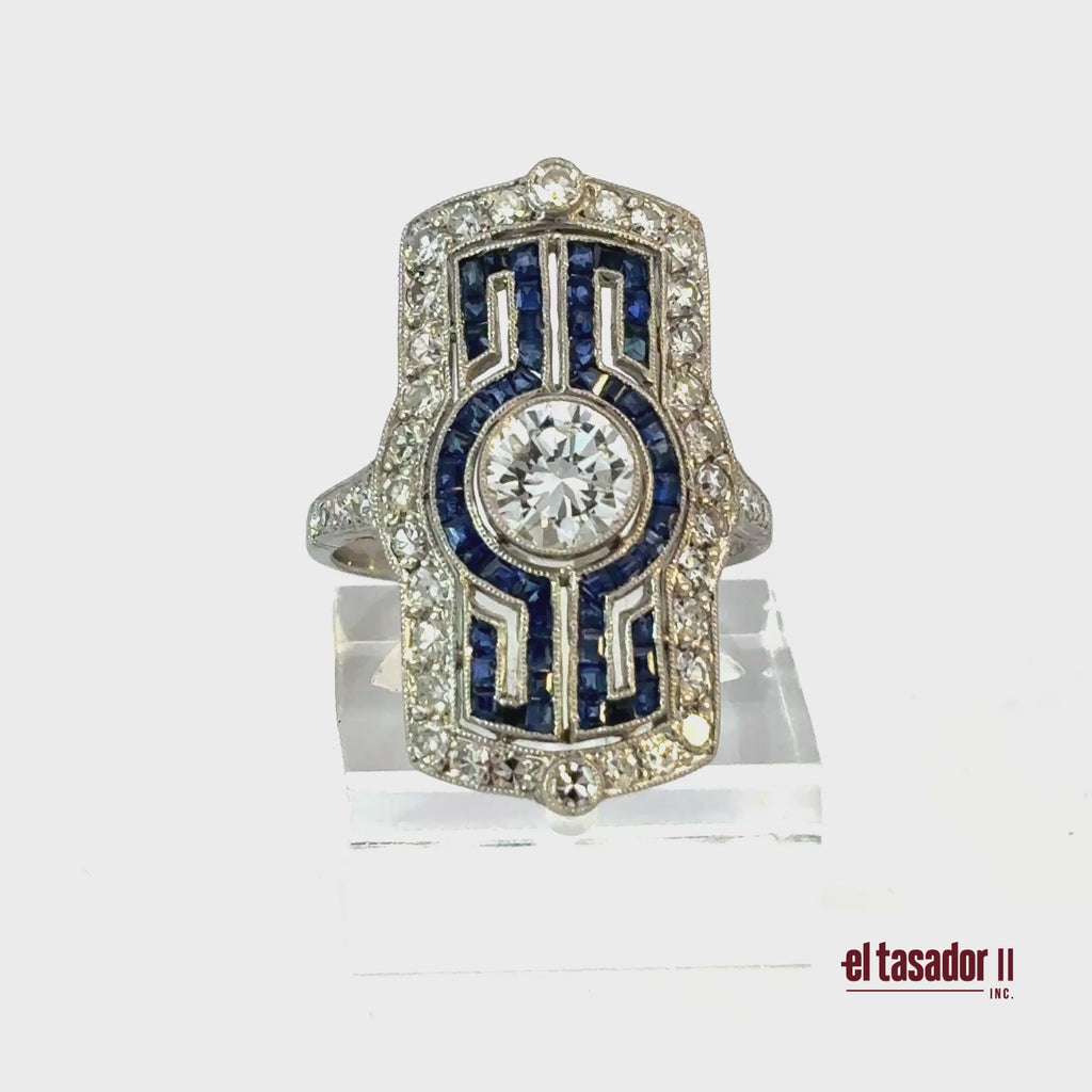 Rectangular ring 7.4 g platinum, center stone 0.95 ct, Sapphires and Diamonds