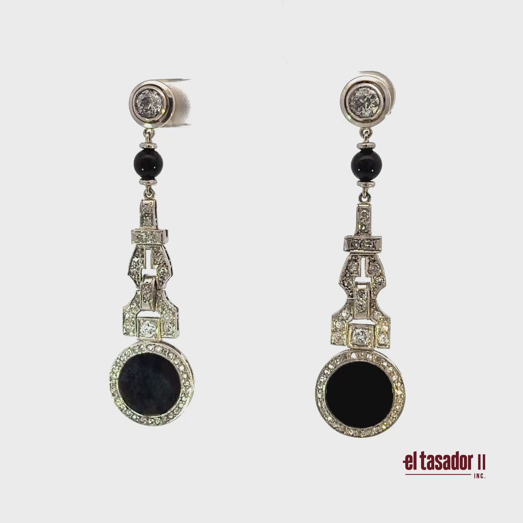 Drop earrings 12.8 g gold & platinum, Center 0.80 ct, onyx & 0.60 ct of diamonds