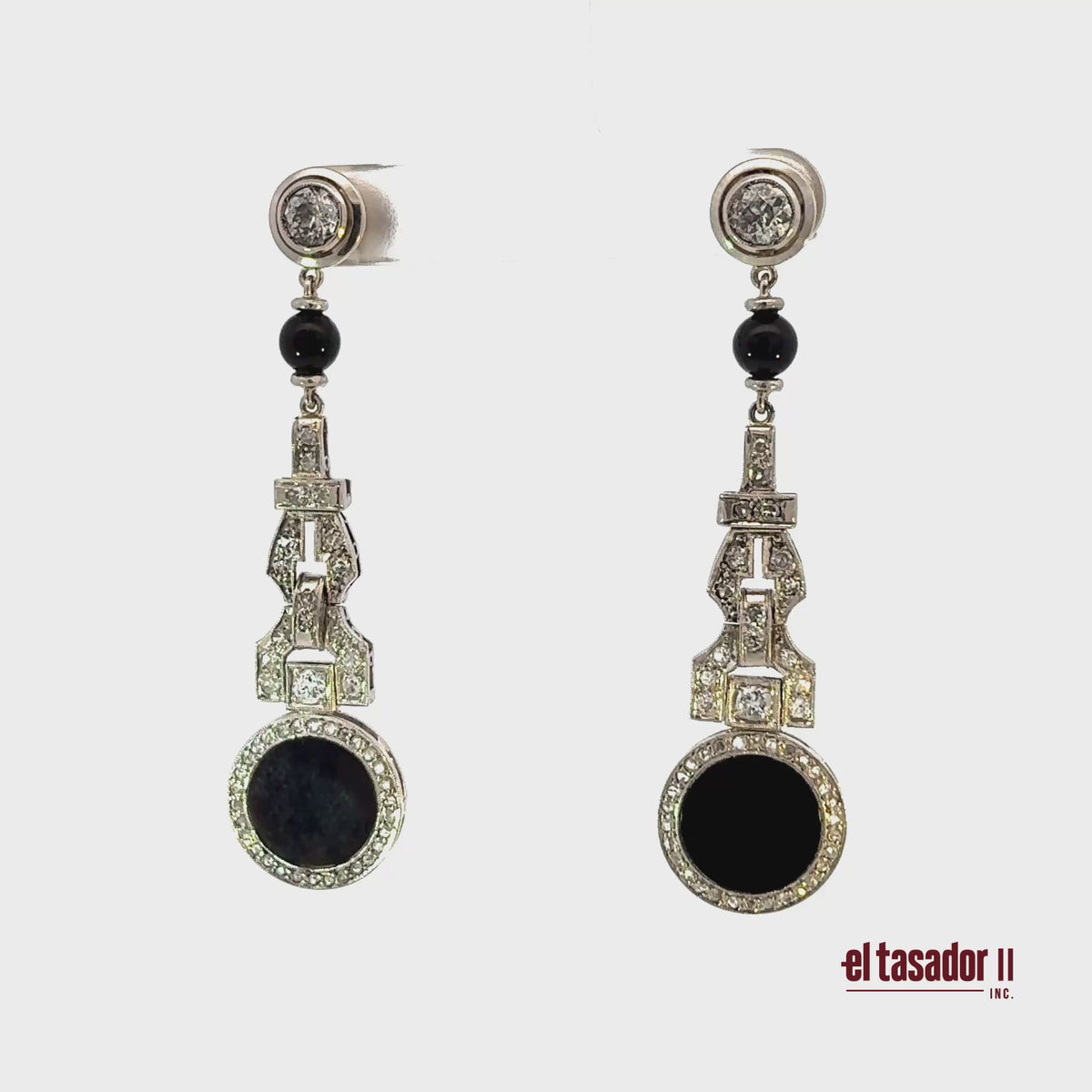 Drop earrings 12.8 g gold & platinum, Center 0.80 ct, onyx & 0.60 ct of diamonds