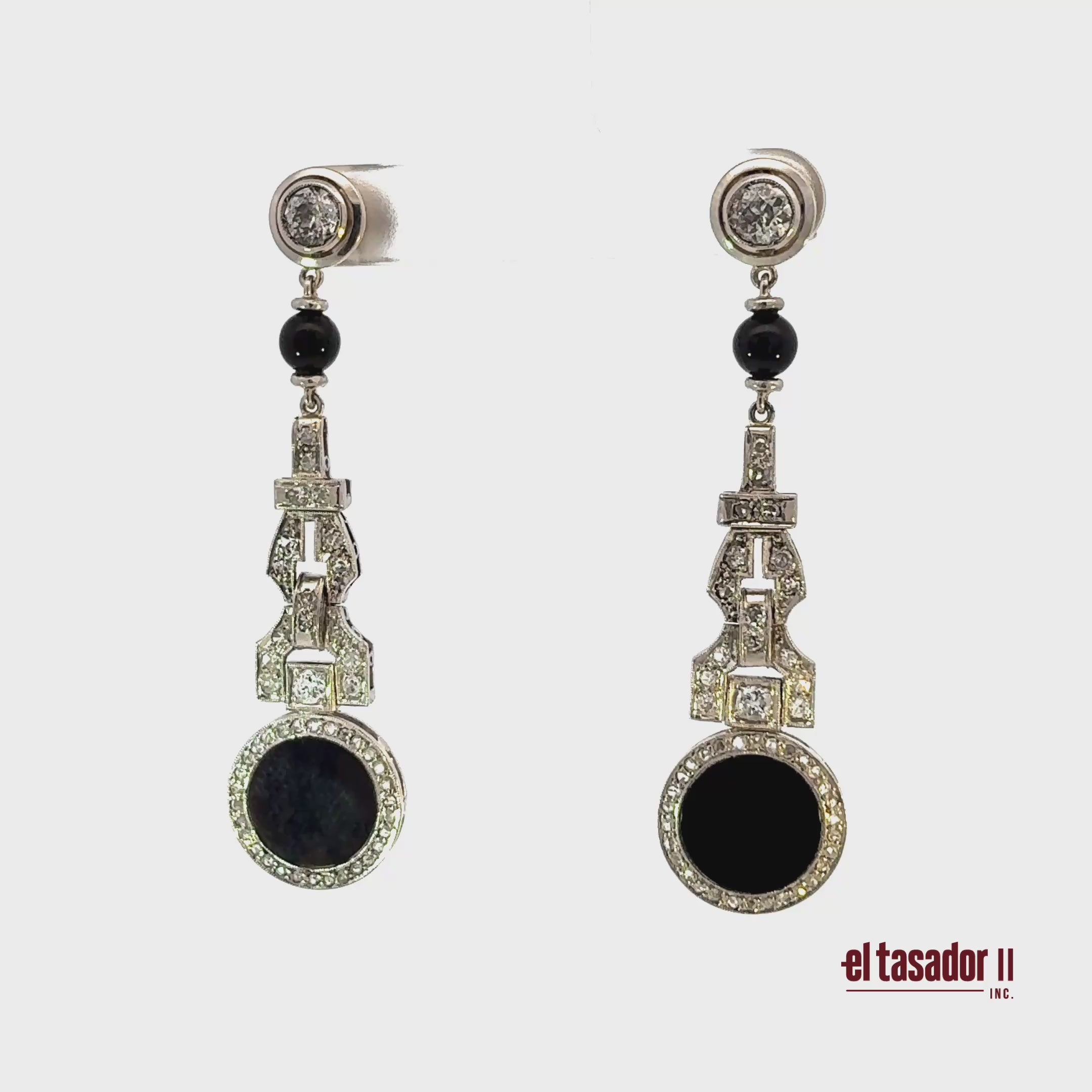 Drop earrings 12.8 g gold & platinum, Center 0.80 ct, onyx & 0.60 ct of diamonds
